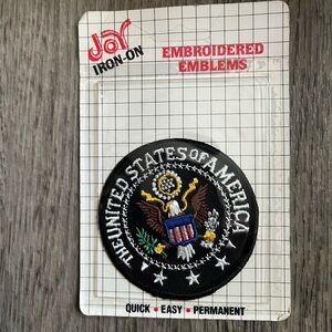 Assorted joy iron on embroidered emblems set of four